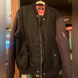 Two tone bomber jacket by Diesel says, I am edgy.
